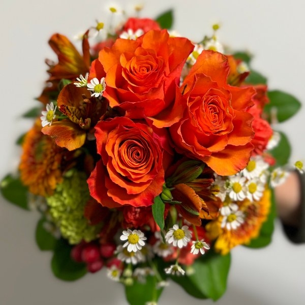 Blumenstrauß in orangetönen Bild 1
